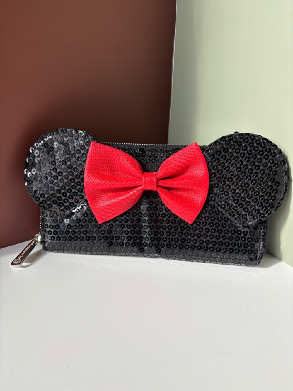 LOUNGEFLY DISNEY Minnie Mouse Black Sequin Ear Wristlet with Red Bow EUC